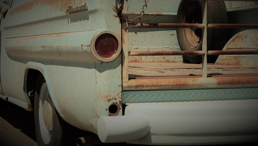 A rusted truck bed needs to be repainted