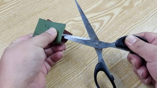 sharpen dulled scissor using sandpaper