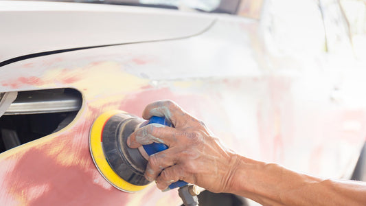 Sanding marks on the car paint left by sandpaper